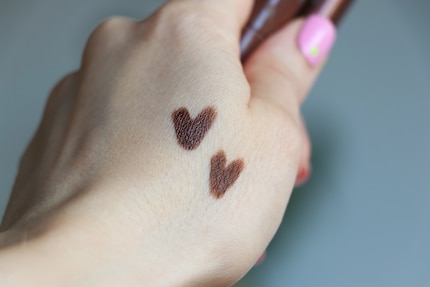 The colour 240 Brown Abyss (with shimmer) above, 420 Brown Bliss (without shimmer) below.