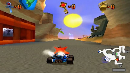 Welcome to the starting line of Crash Team Racing. If I defeat the area boss, I’ll get the key to the door on the left. That’ll take me to the next world.