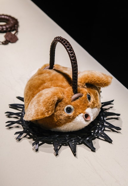 Loewe: Tea cosy, 2024, hand-knitted and crocheted.