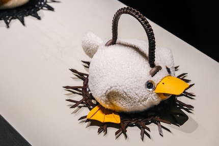 Loewe: Tea cosy, 2024, hand-knitted and crocheted.