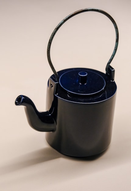 David Chipperfield: Blue Teapot, 2024, stoneware and brass.