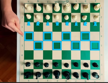 The blue squares mark the trigger point: When a pawn reaches this line, a magnet in the underground reacts and starts the transformation.