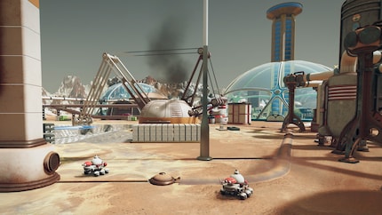 Drohnen wie diese beiden sind das Rückgrat meiner Kolonie: Sie transportieren, bauen und halten instand. Der Screenshot stammt aus «Surviving Mars: Relaunched».