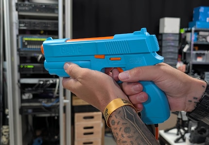 Mit der magischen Taste in der Mitte kann ich unendlich Münzen generieren.