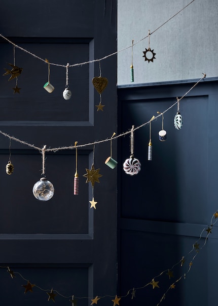 Eine Girlande ist auch ganz ohne Tanne vielseitig einsetzbar.