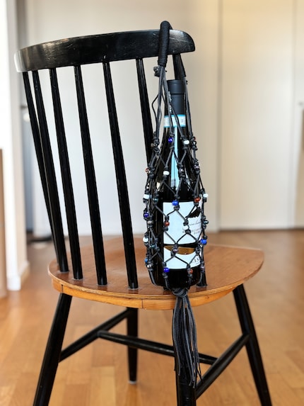 Das hübsche Tragenetz kann auch nach dem Leeren der Flasche noch benutzt werden.