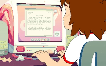 Mara arbeitet an einem ihrer Texte am Computer.