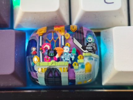 Das Makro überzeugt mich und ich erkenne die lustige Pixellandschaft in einem meiner Keycaps.
