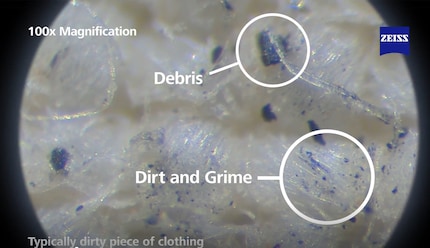 Bei hundertfacher Vergrösserung zeigt sich der Schmutz, der dem Glas zusetzt.