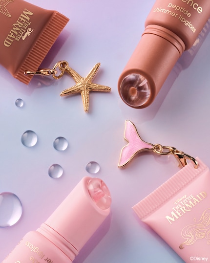 Diese Lippen-Applikatoren sehen aus wie Donuts aus Eis.