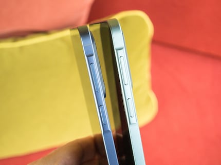 The aluminium frame of the Galaxy A57 (left) is interrupted by small antennas for better reception.