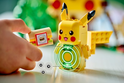Pikachu reacts to a built sandwich. It's interactions like this that make Pokémon more plausible for smart play than Star Wars.