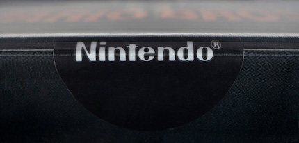The sticker is glossy, intact and looks great.