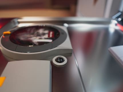 The camera in the dishwasher door next to the powder compartment.