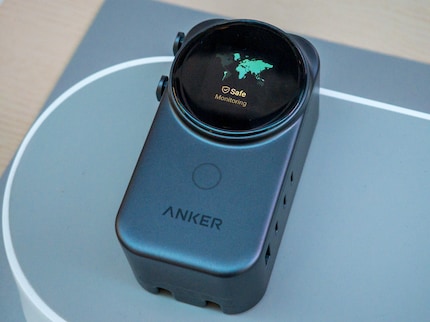 This travel adapter measures the voltage of the socket.