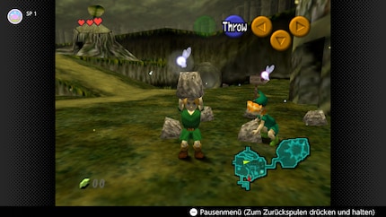 Link hebt einen Stein im Original.
