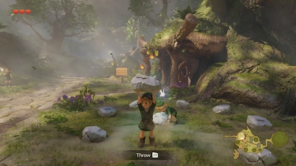 Link hebt einen Stein im Remake. Das Dorf wirkt grösser und spannender. Ich sehe das Ende nicht.