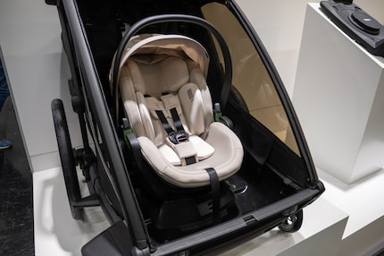 Plenty of space for a baby or toddler: With a seat installed, the two-seater is full.